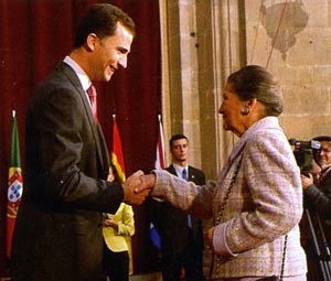 A gentleman properly shaking the hand of a lady