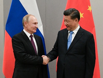 Putin Shaking Hands with Xi Jinping