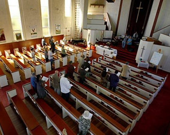 Nearly empty church pews