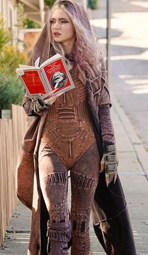 Grimes reading Marx Manifesto