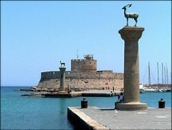 a statue of a stag atop a pillar