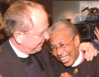 Gay bishop Robinson with woman bishop Barbara Harris