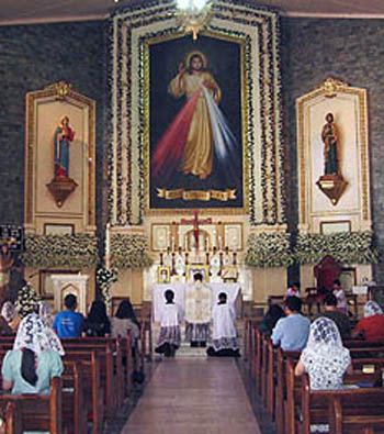 Divine Mercy being venerated at a traditional Latin Mass